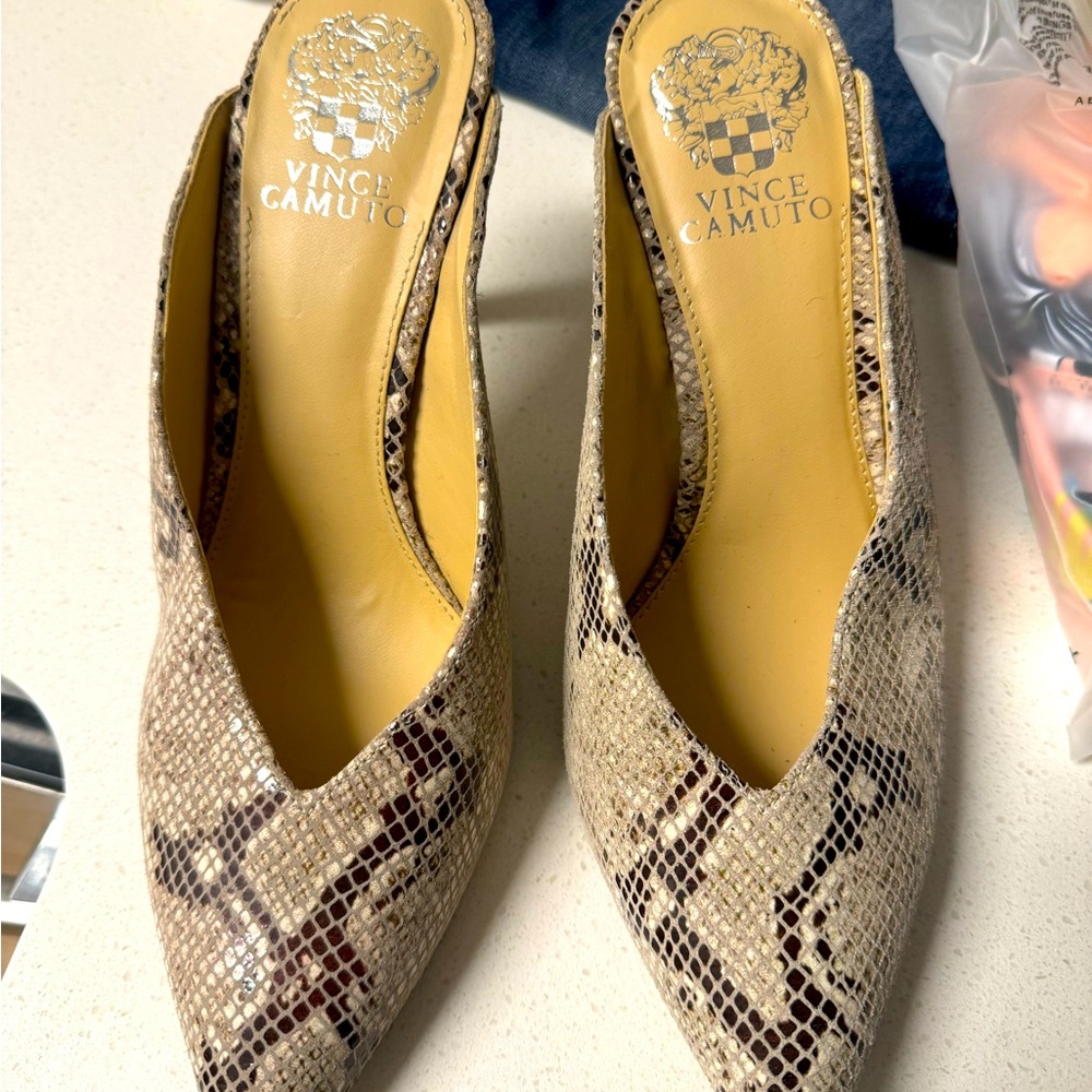 Worn a handful of times, Vince Camuto
